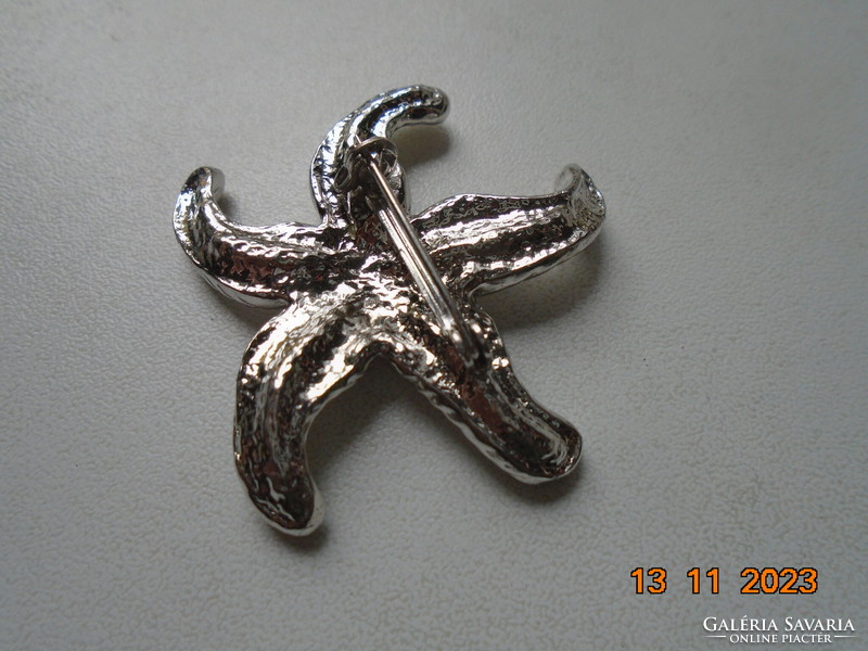 Brand new silver plated starfish brooch with small inlaid pearls