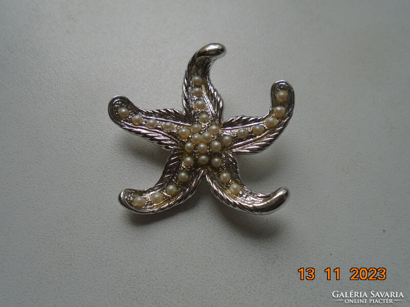 Brand new silver plated starfish brooch with small inlaid pearls