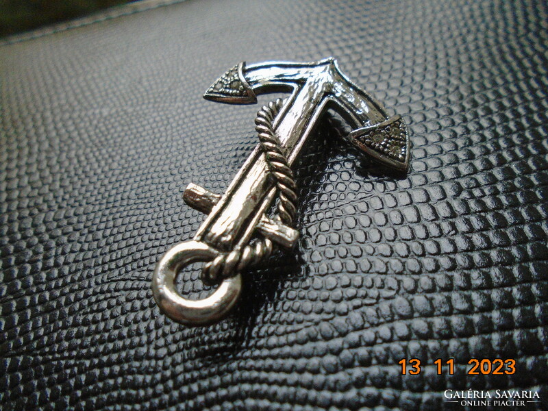 Brand new silver-plated anchor brooch with small polished stones