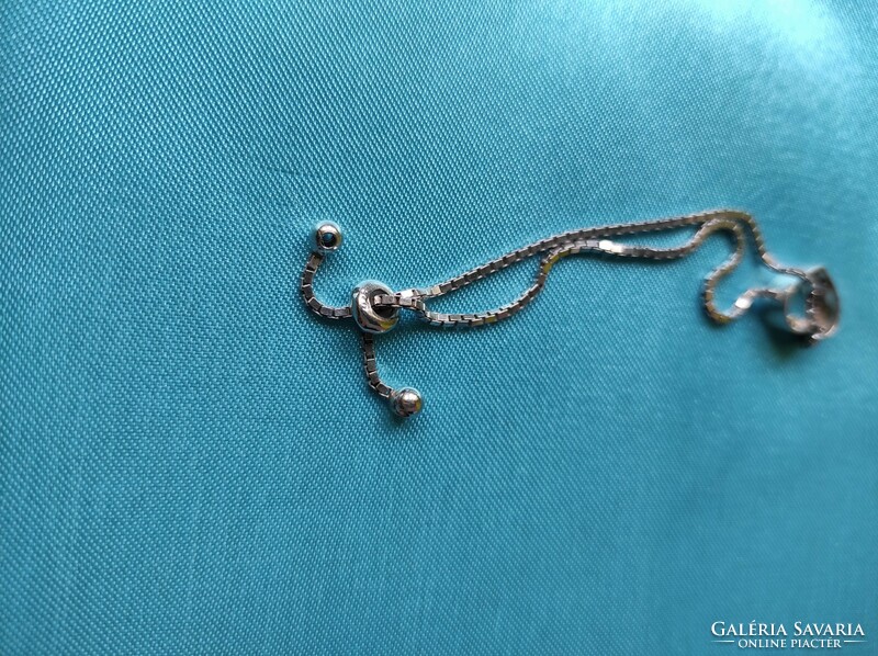 Silver, adjustable bracelet with heart