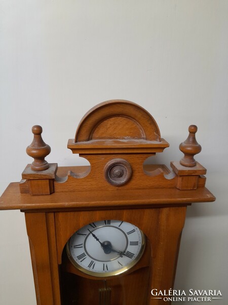 German wooden quartz wall clock, clock. 54 Cm.