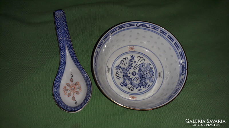 Traditional flawless Chinese rice grain ornament porcelain bowl with accompanying spoon as shown in the pictures