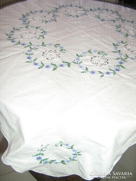 Beautiful crochet lace inlay with cross stitch embroidered floral needlework tablecloth