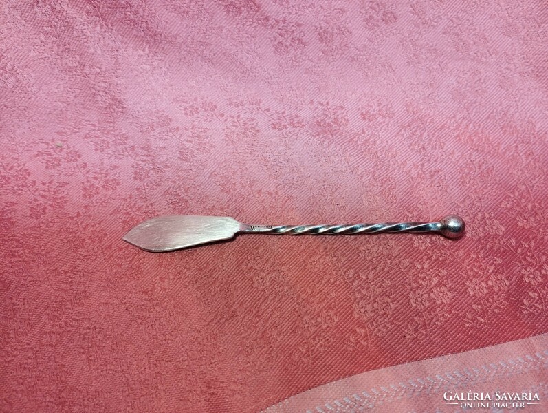 A letter opener, perhaps silver?