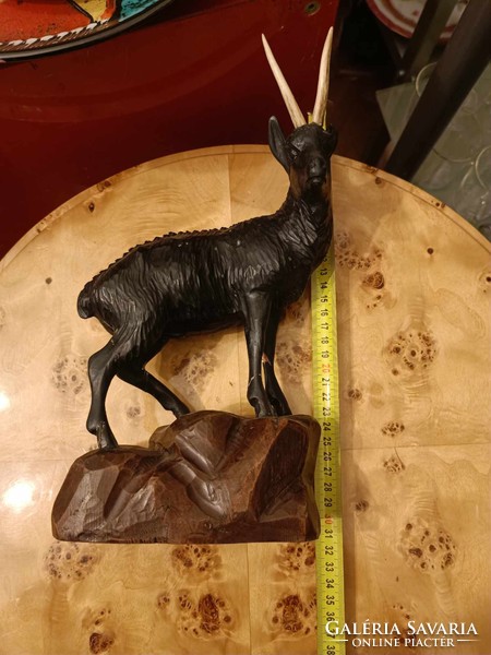 Carved wooden statue of a big chamois of the Black Forest