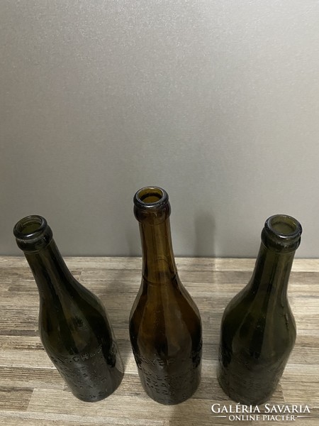 3 old beer bottles