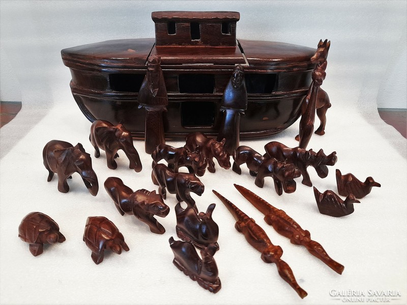 Older African carved exotic wooden Noah's ark with animal figures