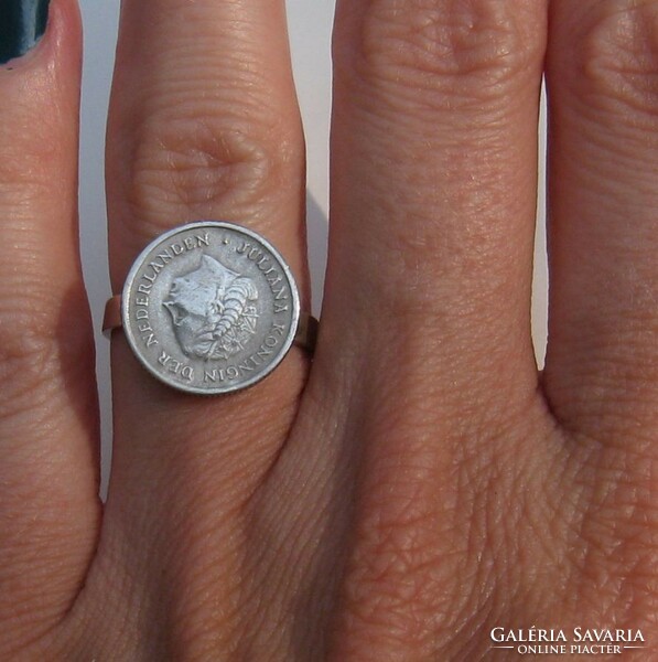 Old silver ring with silver coin