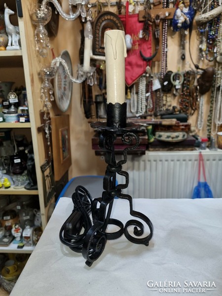 Old renovated wrought iron table lamp