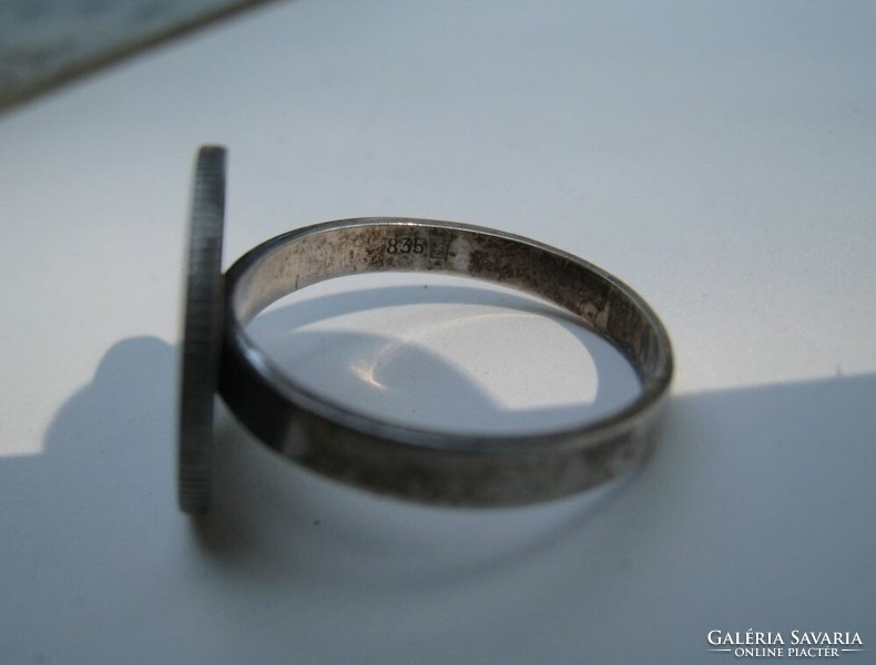 Old silver ring with silver coin