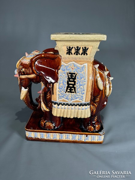 Large ceramic elephant plant stand