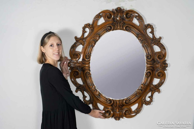 Carved wooden framed round mirror - with tendril decor