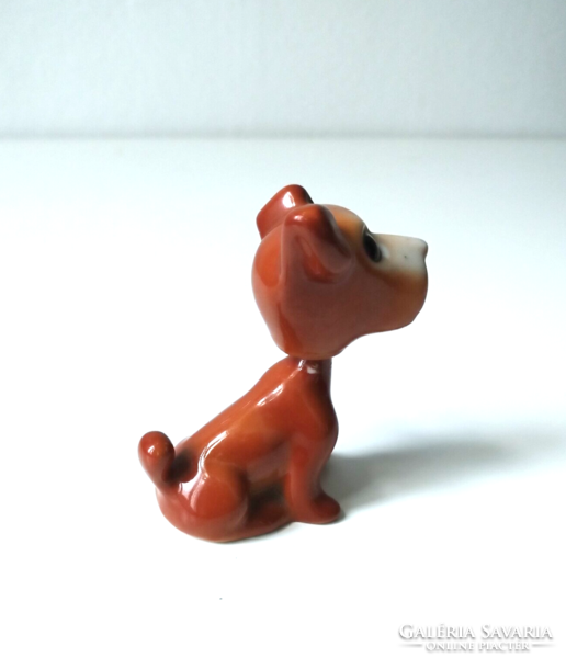 Porcelain swivel head dog, ring holder