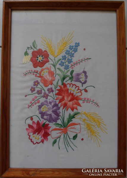Hand embroidery in a pine frame