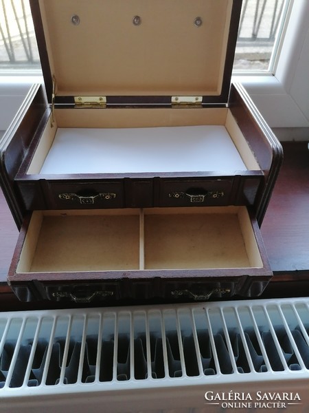 Wooden jewelry box with drawers