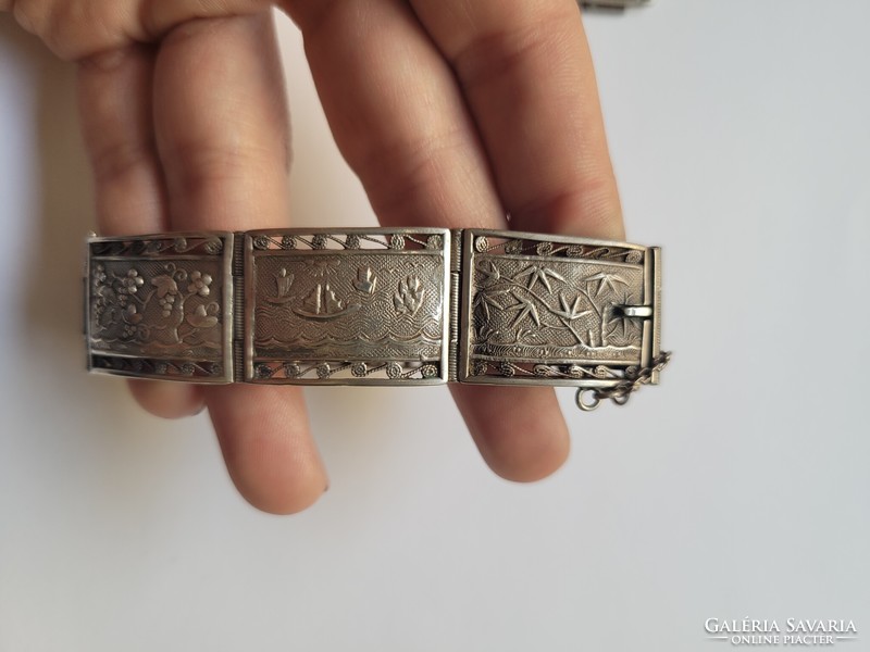 Antique Vietnamese 900 silver bracelet with filigree, plant, house and sea motifs can be expanded with extra eyes!