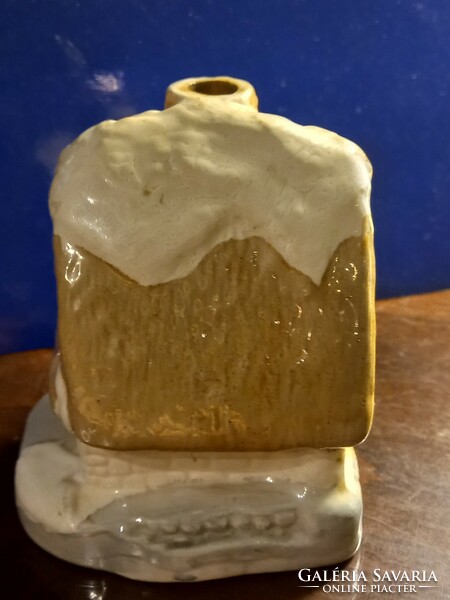 Ceramic small cottage candle holder.