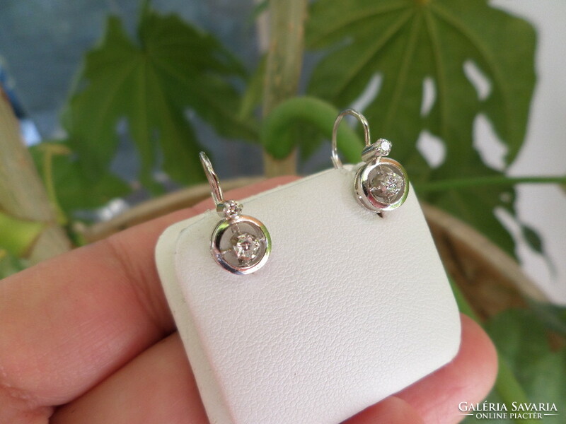 A pair of white gold brillé earrings