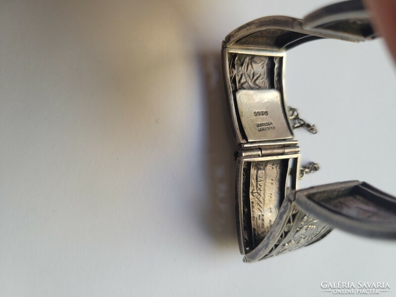 Antique Vietnamese 900 silver bracelet with filigree, plant, house and sea motifs can be expanded with extra eyes!