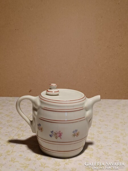 Old barrel-shaped porcelain jug spout marked