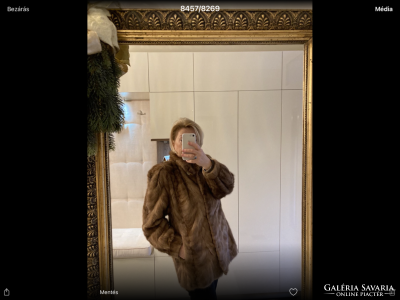 My short, light, warm mink fur coat is for sale