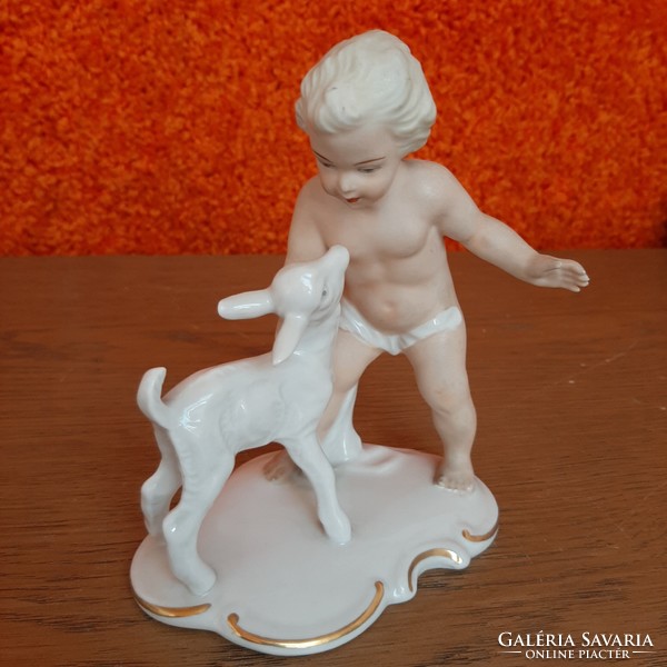 Immaculate porcelain sculpture with Schaubach kunst putto kid for sale