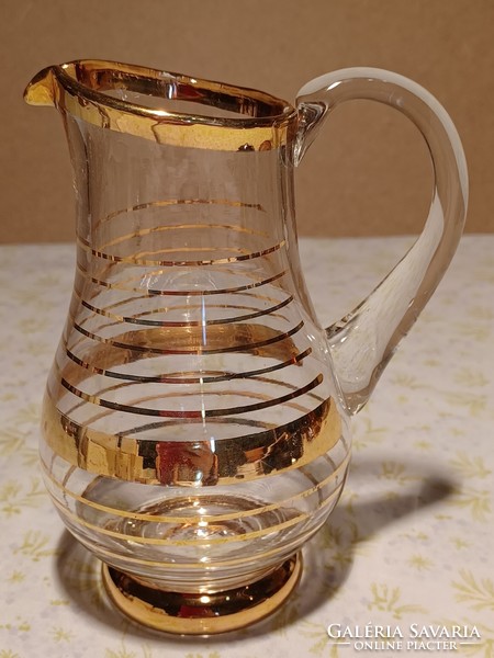 Small glass jug with gold stripes
