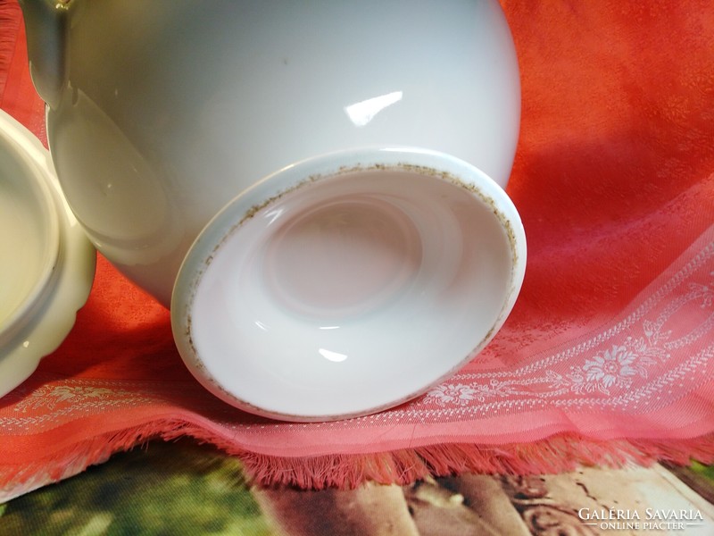 Antique stoneware soup bowl with lid, center of the table