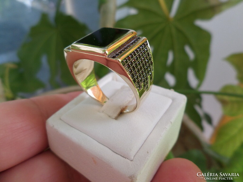 Modern gold men's ring with black stones