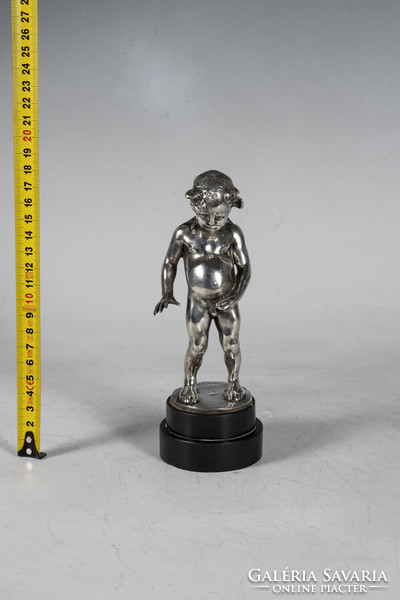 Silver child figure