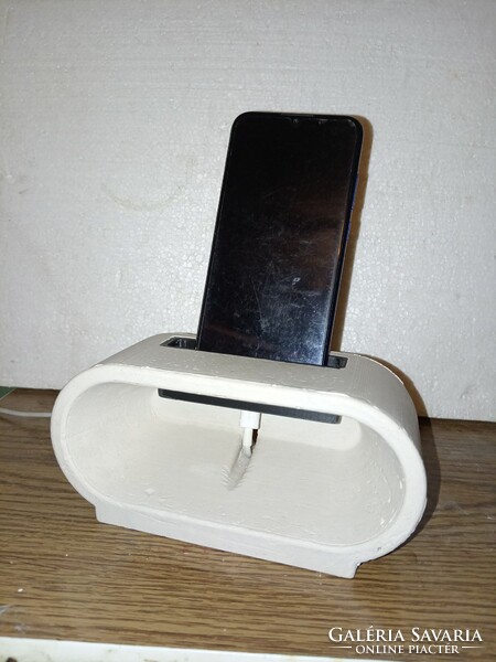 Mobile phone table holder, dock, passive amplifier cast design piece