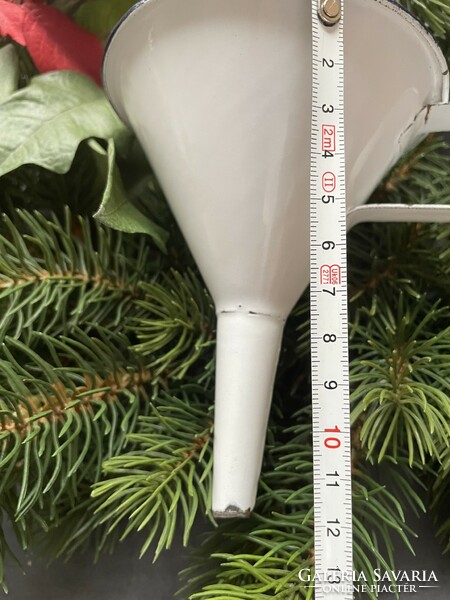 Old white enamel funnel