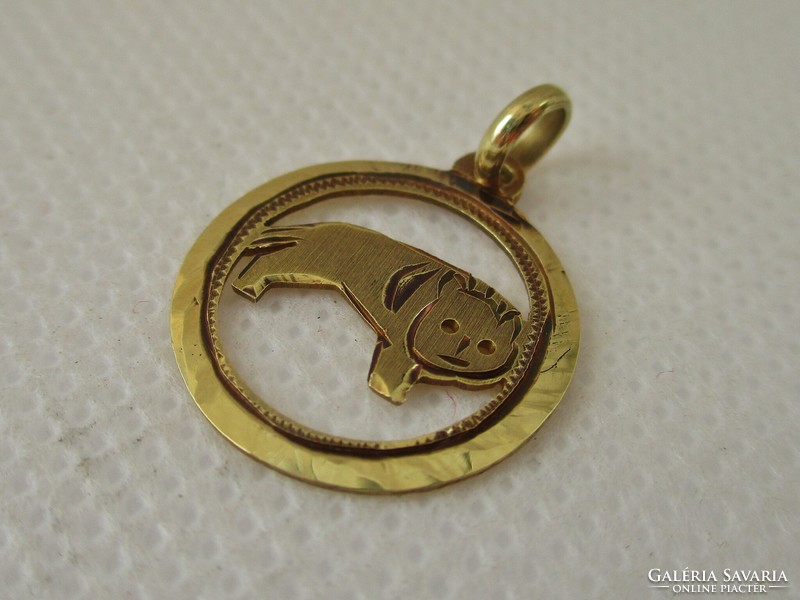 Nice old gold horoscope pendant lion 14kt