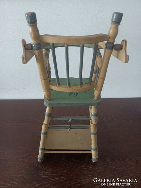 Wooden children's toy/variable toy high chair, with painted decoration.