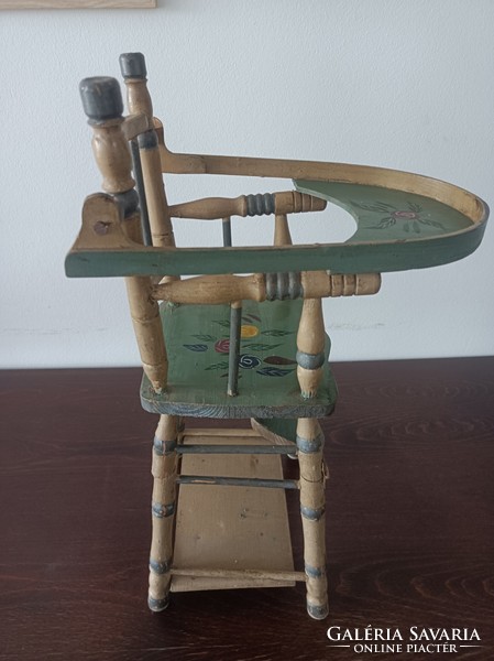 Wooden children's toy/variable toy high chair, with painted decoration.
