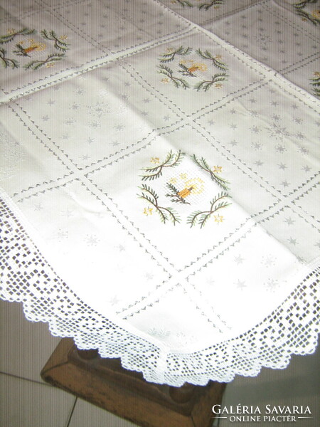 Damask tablecloth with a beautiful Christmas pattern embroidered with a lace edge