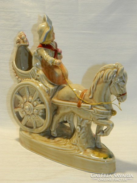 Larger GDR baroque man in horse-drawn carriage