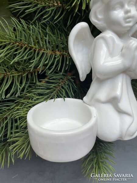 Beautifully crafted praying, snow-white porcelain angel face candle holder