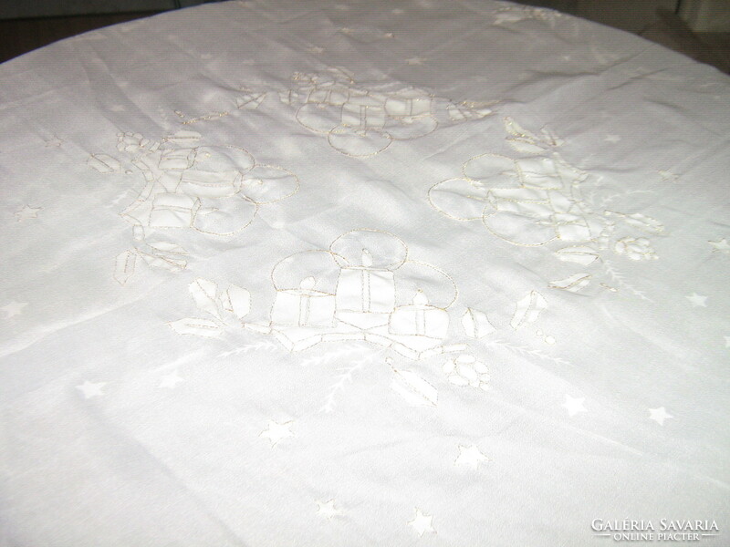 Christmas tablecloth embroidered in beautiful white material with gold threads