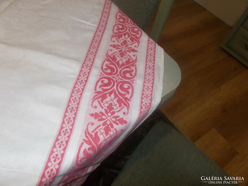 Very nice damask tablecloth with red edges