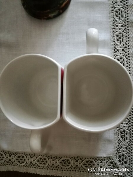2 ceramic mugs together