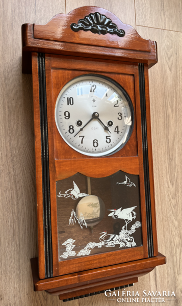Wall clock, with half-baking mechanism, 20th century