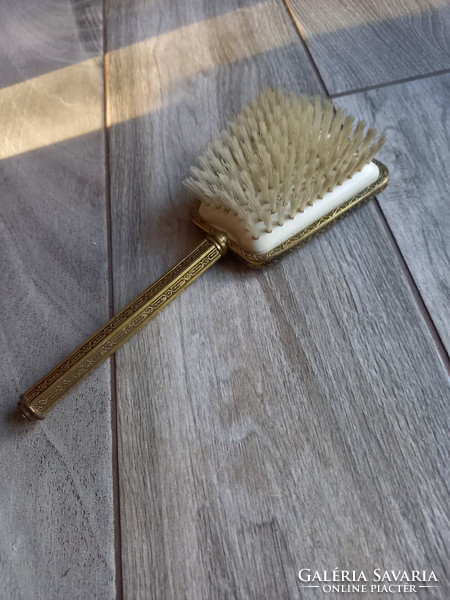 Marked antique hairbrush with metal frame (23x8.8x3.5 cm)