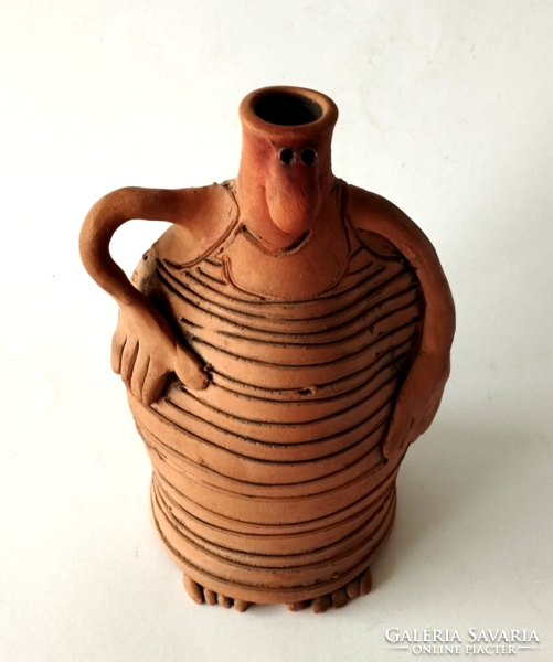 Figurative vase of fired clay by a humorous industrial artist