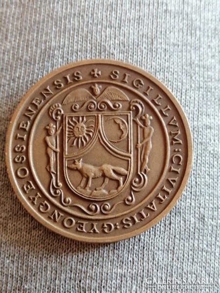 Four commemorative coins