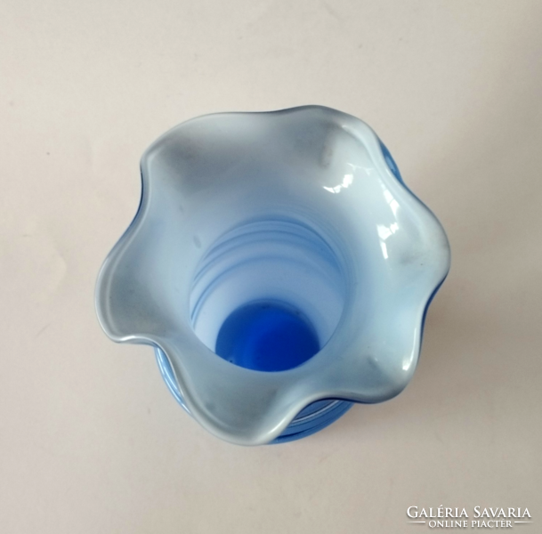 Artistic vase of blue opaline glass with a ruffled rim