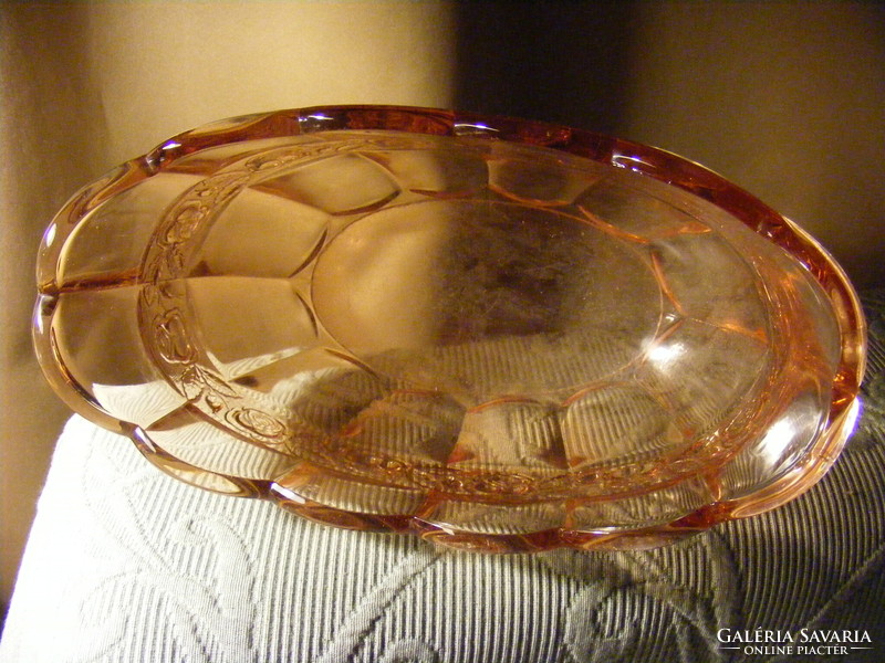 Pink glass serving bowl with a rose pattern