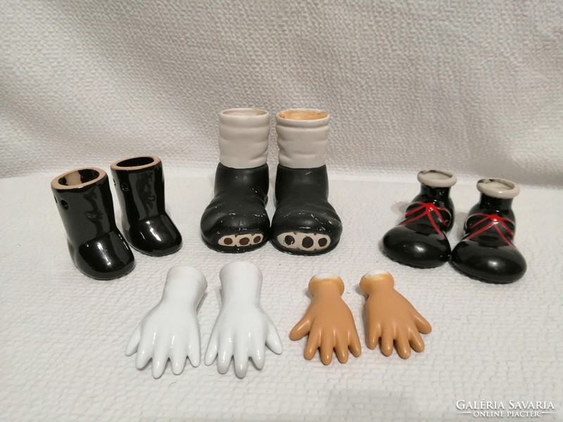 Ceramic clown parts, hands, shoes, in a package