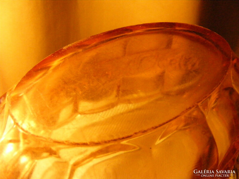 Pink glass serving bowl with a rose pattern