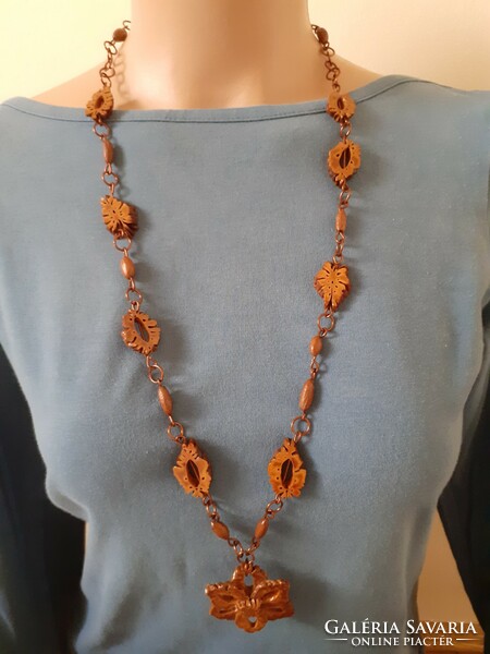 Necklace made of long retro fruit (peach seed???) + similar ear clip in gift style